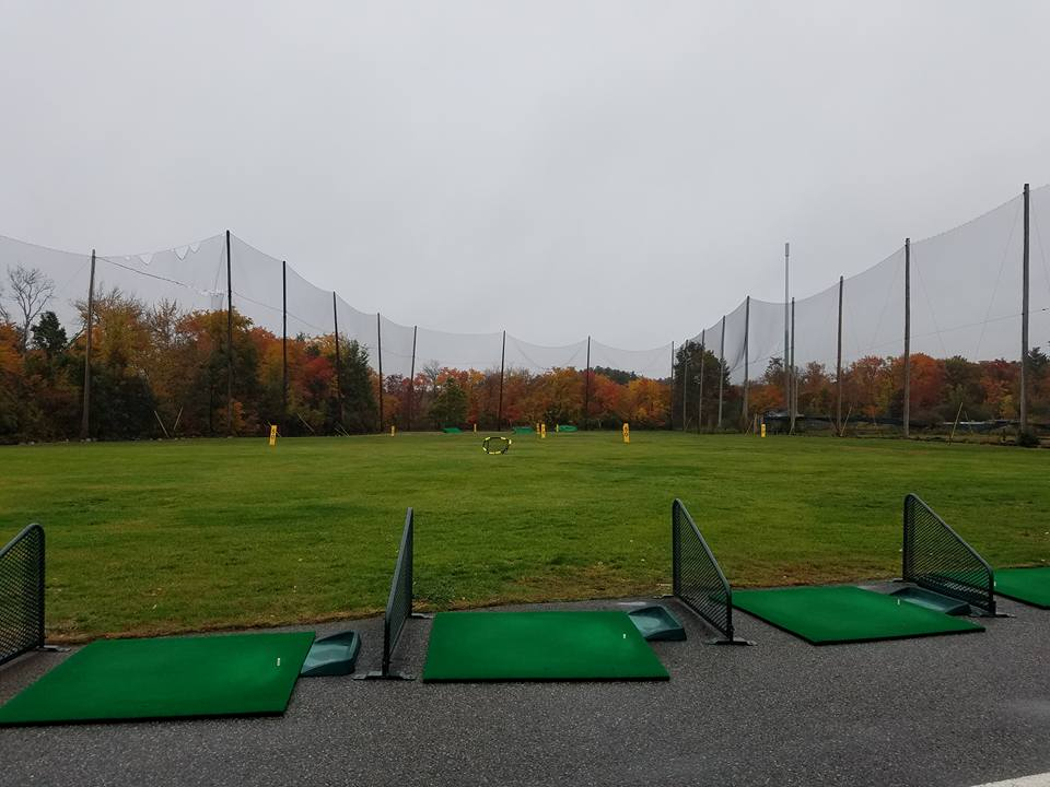 Driving range field with fall foliage